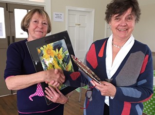 In 2018 the subject was 'Celebrate Spring"
 The winner was Val Hebble-Thwaite with her delightful painting of 'Daffodils'